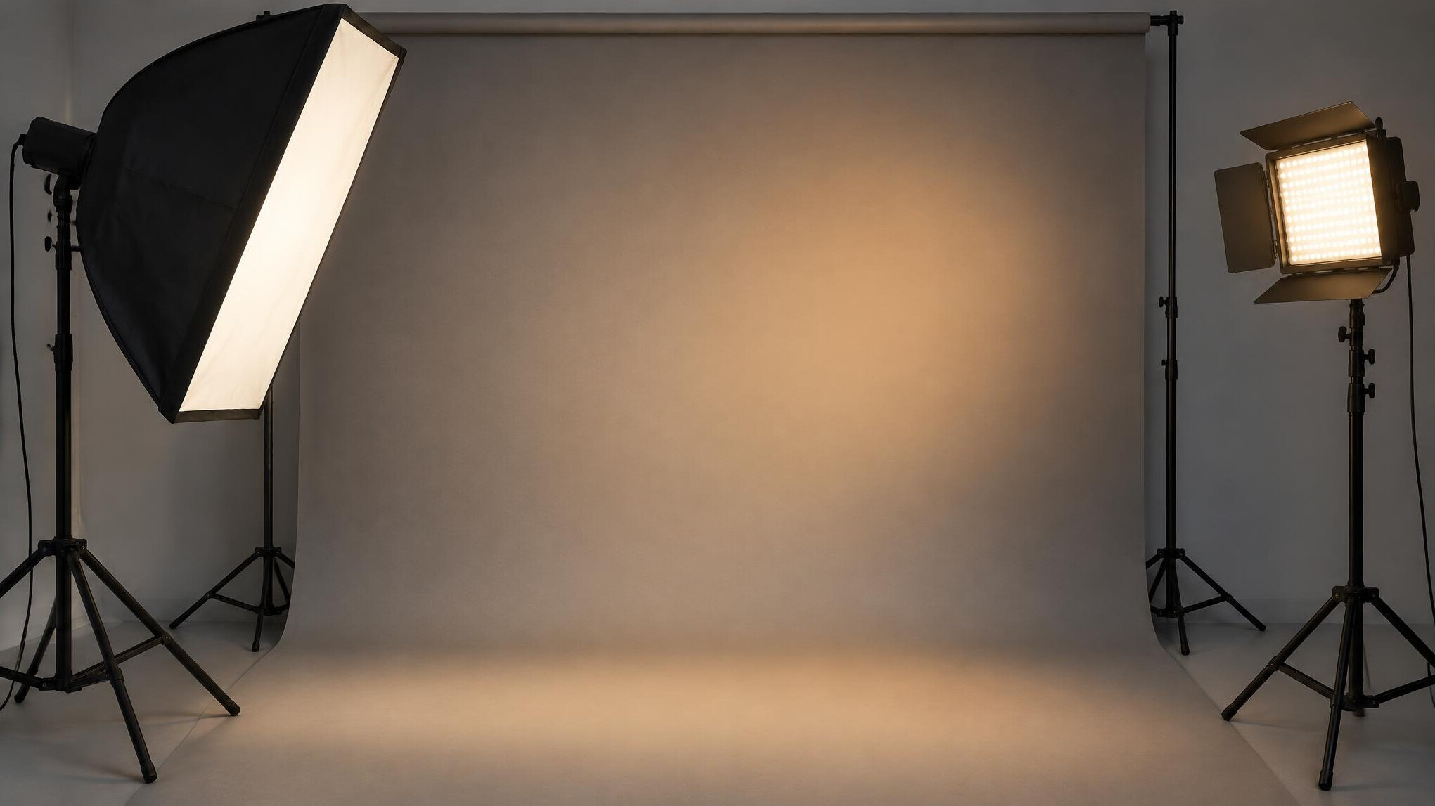 Studio lighting setup with a softbox and warm light
